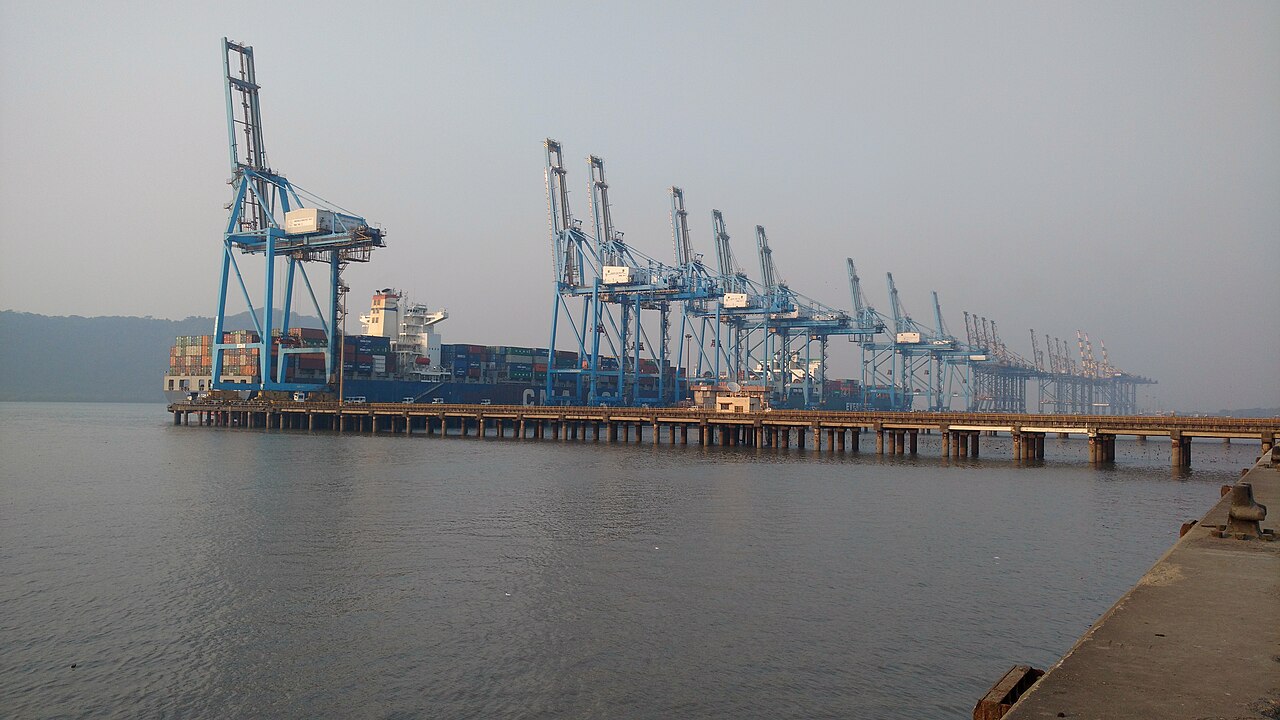 Container ship and rows of cargo cranes at Jawaharlal Nehru Port, India; illustrative photograph.
